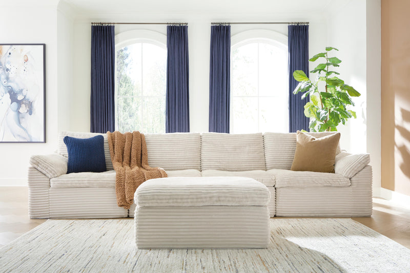 Canefield 4-Piece Sectional with Ottoman