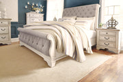 Realyn Sleigh Bed