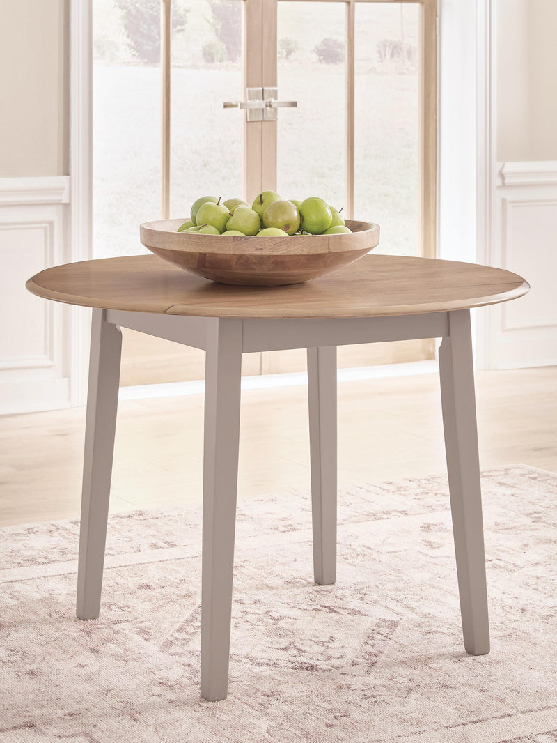 Harperfeld Round DRM Dining Tables