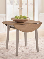 Harperfeld Round DRM Dining Tables
