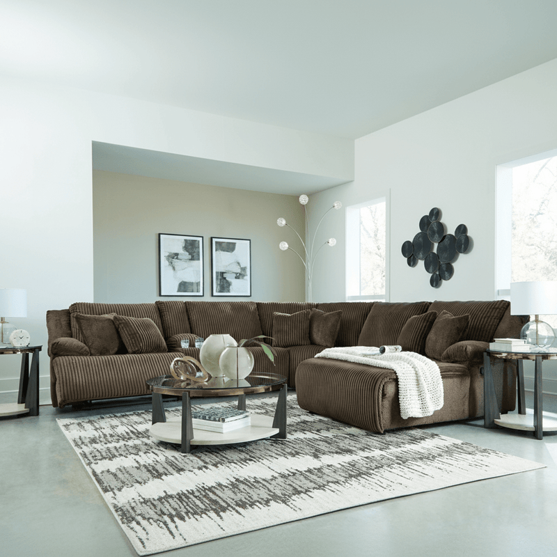 Top Tier 4 - Piece Reclining Sectional with Chaise - Berre Furniture