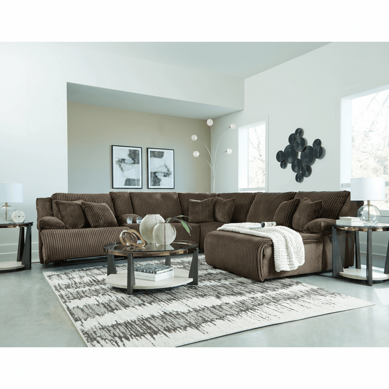 Top Tier 4 - Piece Reclining Sectional with Chaise - Berre Furniture
